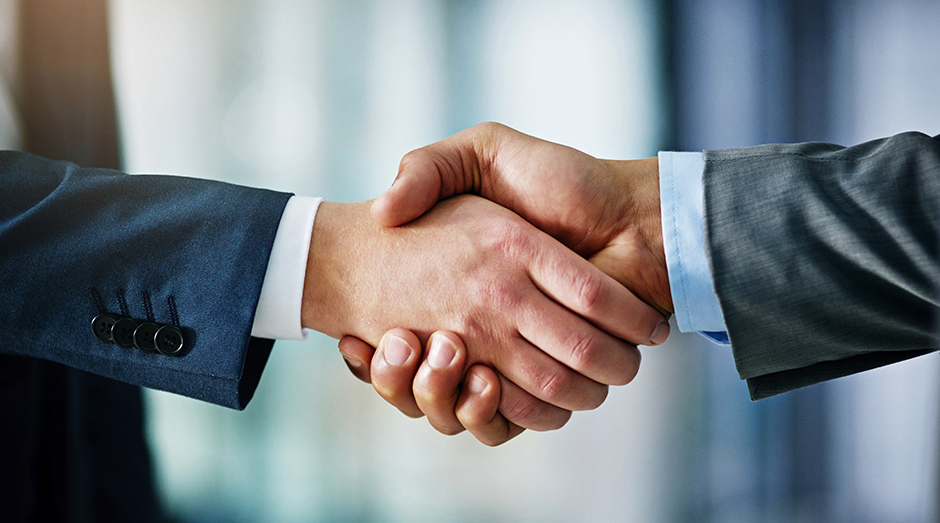 Business partners shaking hands