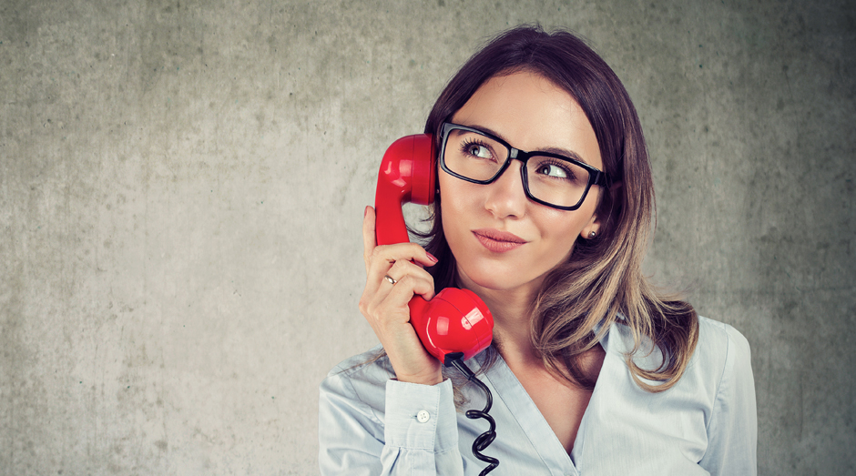 Girl on landline phone